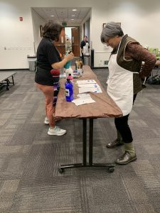 Art class teacher and student