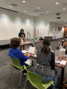 Art class teacher and student