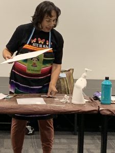 Alma gets student started on the background