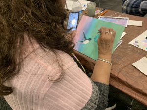 Students painting in Vista Library art class