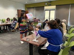 Students painting in Vista Library art class