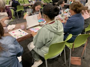 Students painting in Vista Library art class