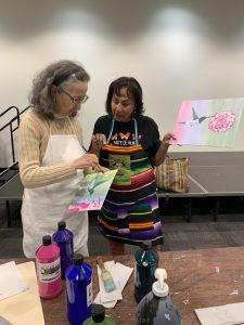 Students painting in Vista Library art class