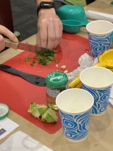 Chopping veggies in the mocktail class