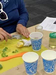 Chopping veggies in the mocktail class