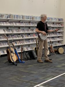 Craig Newton presenting the Joy of Music with his many instruments