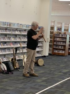 Craig Newton presenting the Joy of Music with his many instruments