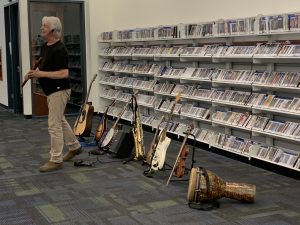 Craig Newton presenting the Joy of Music with his many instruments